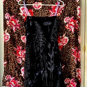 Size small below the knee length Ribbon lace type material